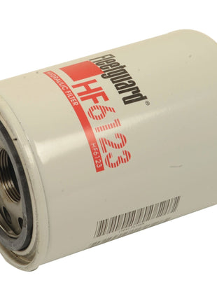 Image of a Sparex HF6123 hydraulic filter (Sparex Part No.S.76532), highlighting its cylindrical shape, prominent branding, and product code printed on the side. This filter ensures top performance and is compatible with Ford New Holland systems and Massey Ferguson filters.