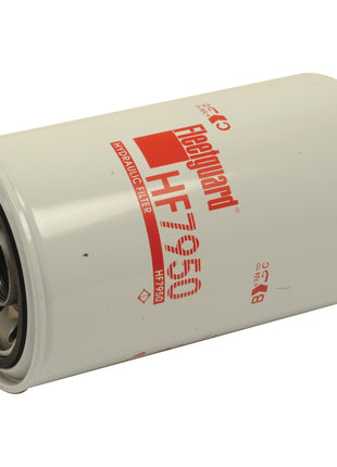 The Sparex Hydraulic Filter - Spin On (S.76704), also known as Fleetguard HF7950, is a white cylindrical filter featuring red labeling and metal fittings on one end. It is essential for maintaining the performance of your Massey Ferguson 3383386M92 machinery.