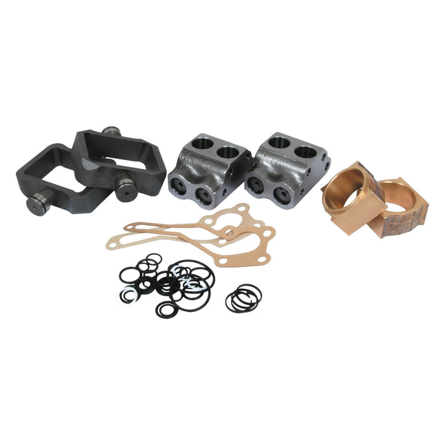A selection of mechanical components, such as gaskets, seals, spacers, and metal brackets, displayed on a white background showcases items perfect for the Hydraulic Pump Repair Kit by Sparex (Part No. S.40844) or Valve Chamber Assembly. Ideal for maintaining Massey Ferguson equipment.