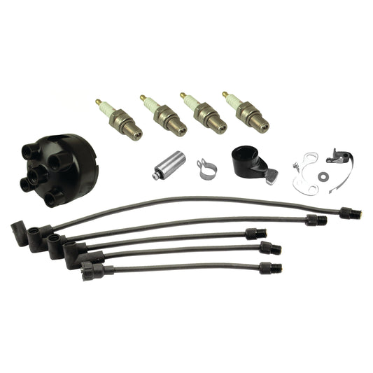 The Ignition Kit (Sparex Part No. S.43667) designed for TED20 Massey Ferguson is an automotive tune-up kit that includes spark plugs, ignition wires, a distributor cap, and other related components, all arranged on a white background.