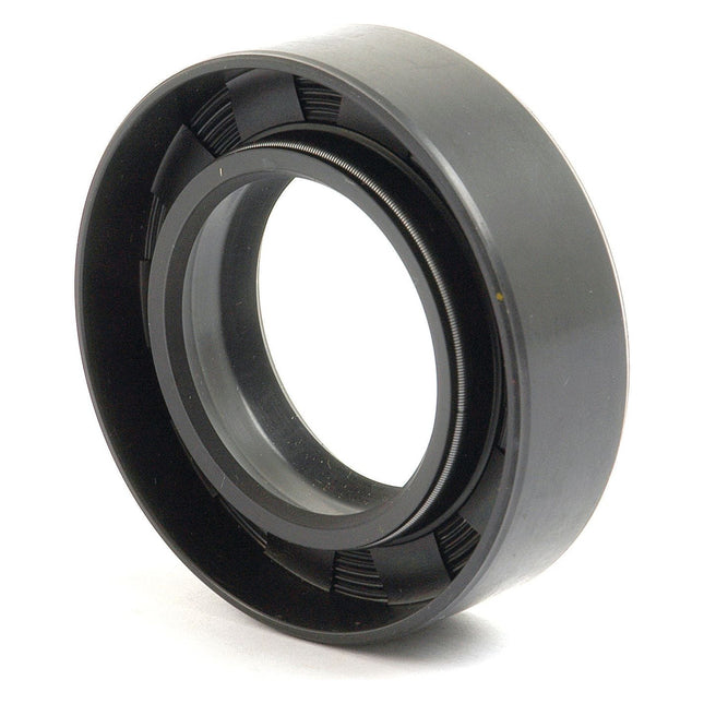 A black rubber oil seal with a circular shape, like the Sparex Imperial Rotary Shaft Seal (Sparex Part No. S.65670, dimensions 1 1/2'' x 2 1/2'' x 3/8''), used to seal the entry point of rotating shafts in Ford New Holland machinery to prevent the leakage of lubricants.