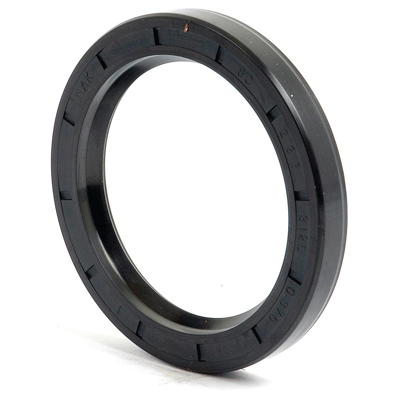A black circular rubber Imperial Rotary Shaft Seal, 2 5/16'' x 3 1/8'' x 3/8'' Single Lip (Sparex Part No.S.40807), with ridges on the exterior edge, standing upright on a white surface.