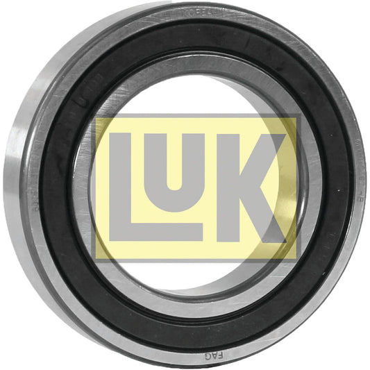 The LUK Clutch Release Bearing - S.146390 by Sparex, featuring a metal ball bearing with a black rubber seal and partially overlaid by a yellow "LUK" logo, is designed for use in IH / International Harvester vehicles.