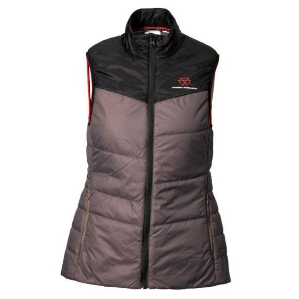 The AGCO Massey Ferguson Ladies Grey Padded Vest (X993322216) is a sleeveless, color-block quilted vest in black and grey with lightweight padding and a high zip-up collar. It features red lining visible on the armholes and a small red logo on the upper left chest. This women's padded jacket is made from 100% nylon fabric for added durability.