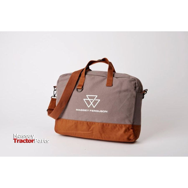 Introducing the Massey Ferguson Laptop Bag, model X993512201000 from AGCO. This stylish grey and brown bag prominently displays the "Massey Ferguson" logo and text on the front. It features a comfortable carrying handle, an adjustable shoulder strap, and a dedicated notebook compartment to ensure professional working comfort on the go.