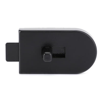 Introducing the AGCO Massey Ferguson - Latch Rear Window 3477711M1: a sleek black plastic clip featuring a rectangular slot, a central button, and a slightly curved edge on one side, designed to perfectly complement the iconic style of the Massey Ferguson 300 Series tractors.