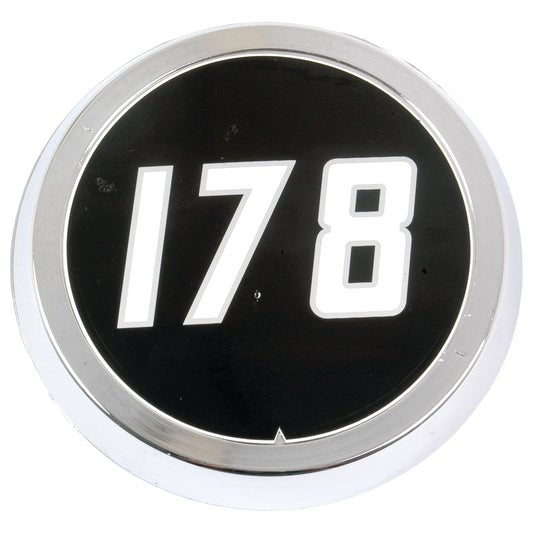A circular medallion featuring the number "178" in white, set against a black background with a silver border, from Sparex, labeled as Medallion - Massey Ferguson 178 | Sparex Part No. S.42551.