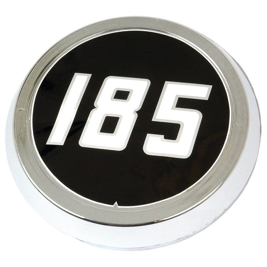 The Medallion - Massey Ferguson 185 (Sparex Part No. S.42552) features a metal automotive badge with "185" in white on a black circular background, surrounded by a chrome border. Resembling a medallion, it is perfect for enthusiasts of the Massey Ferguson 185 and is available through Sparex.