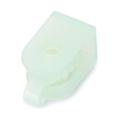 A translucent white plastic Massey Ferguson Nut M4 Cladding (4289782M1) from the AGCO brand, featuring a hole for mounting and a rounded end.