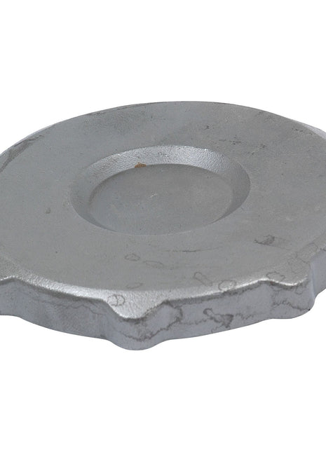 A flat, round metallic disc with a small raised central area and irregular edges, appearing as a PTO Freewheel Flange (RH), Sparex Part No. S.6184 from the brand Sparex.