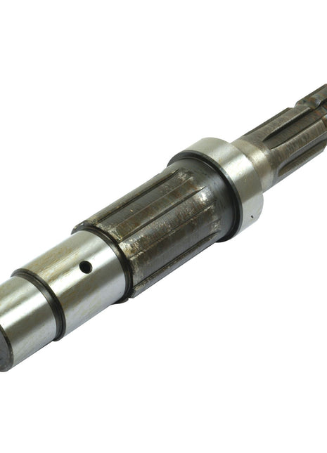 Close-up of the PTO Shaft - S.15532 by Sparex, showcasing its cylindrical metallic form with 6 splines, grooves, keyways, and a polished surface.