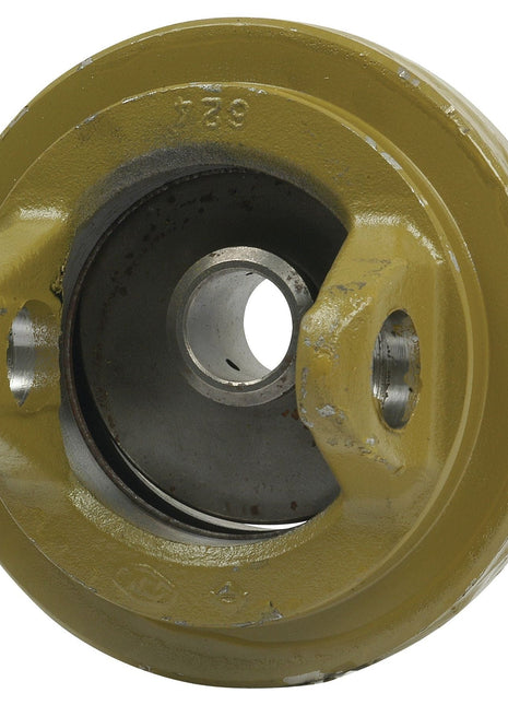 A close-up image of a yellow Sparex PTO Wide Angle Centre Body (U/J Size: 32 x 76 & 27 x 94mm), Sparex Part No. S.6665, featuring a central circular hole and two smaller side holes, displaying signs of metal wear.