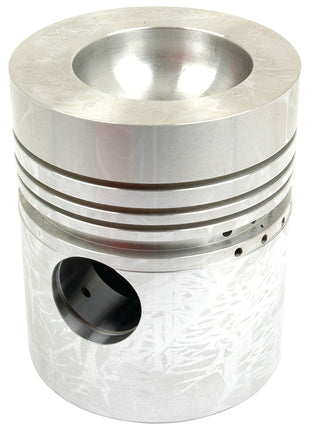 The Sparex Piston (Standard) - S.40411, a metallic cylinder-shaped component with a domed top, several grooves around its circumference, and a central hole near the bottom, featured prominently in the Perkins Build List.