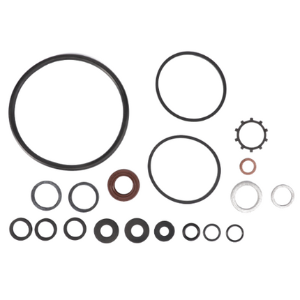 An assortment of various-sized rubber and metal O-rings from the AGCO Massey Ferguson Power Steering Pump Seal Kit - 1635948M92, suitable for Massey Ferguson tractor maintenance, displayed on a white background.