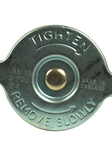 A Sparex Radiator Cap - S.8454, with inscriptions indicating to tighten clockwise, remove slowly, and stating "Made in England" with specifications "10psi, LBS. 10, G100, Z4".