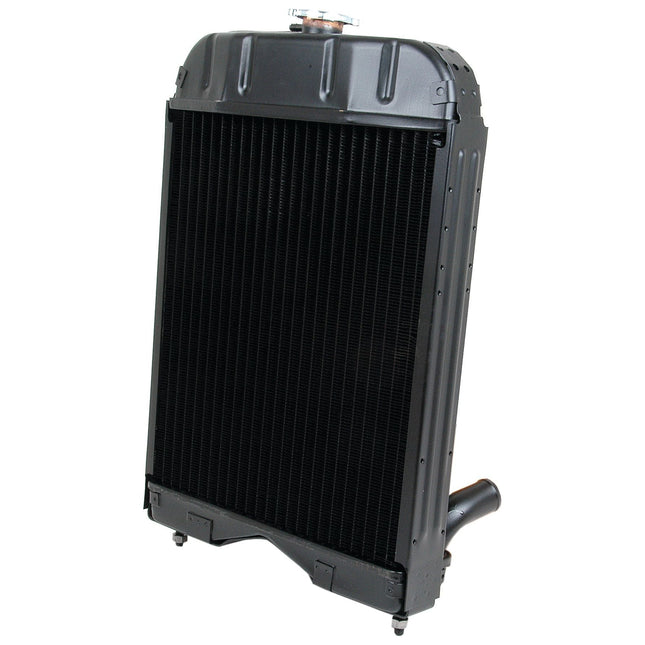 A Sparex Radiator - S.42410 with black metal fins and a cap on top, featuring an inlet and outlet pipe at the bottom.