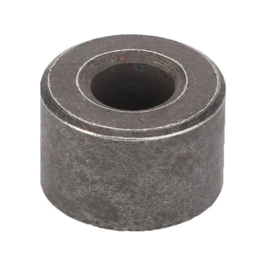 A small cylindrical metal bearing with a central hole and a slightly rough surface texture, commonly known as Massey Ferguson - Roller - 898189M2 from AGCO.