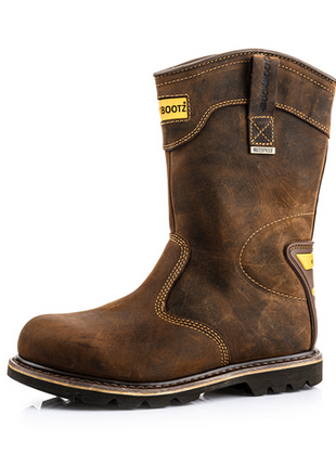 A single Buckler Safety Rigger Boot - B701Smwp, in brown leather with yellow accents, thick soles, and visible stitching, featuring a waterproof breathable membrane and enhanced ankle protection, shown against a plain white background.