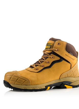 Introducing the Buckler - Tradez Blitz Waterproof Safety Boots - Blitzhy by Buckler: a sleek yellow and brown lightweight safety boot with laces. This model is designed with a reinforced, metal-free toe cap and heel, complemented by black accents and finished with a distinctive yellow and black sole.