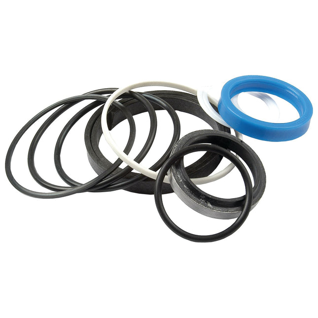 A variety of Sparex Seal Kits (Stabiliser Ram) in black, white, and blue are scattered on a white background, ideal for Massey Ferguson machinery.