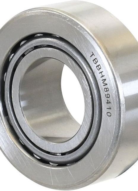 Close-up of a silver metal ball bearing with the markings "HM89446" and "HM89410" etched on its surface, commonly used as a Sparex Taper Roller Bearing (S.42945) in various applications.