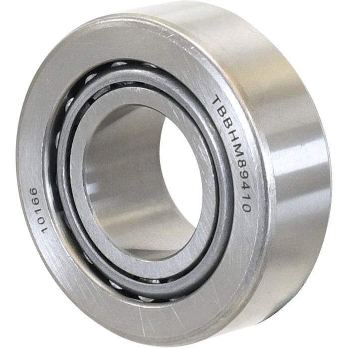 Close-up of a silver metal ball bearing with the markings "HM89446" and "HM89410" etched on its surface, commonly used as a Sparex Taper Roller Bearing (S.42945) in various applications.