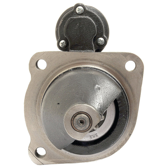 Close-up view of the Sparex Starter Motor - 12V, 4.2Kw, Gear Reducted (Mahle) | Sparex Part No.S.36199, featuring metal mechanical parts with bolts and a circular central component that showcases a turbine-like structure.