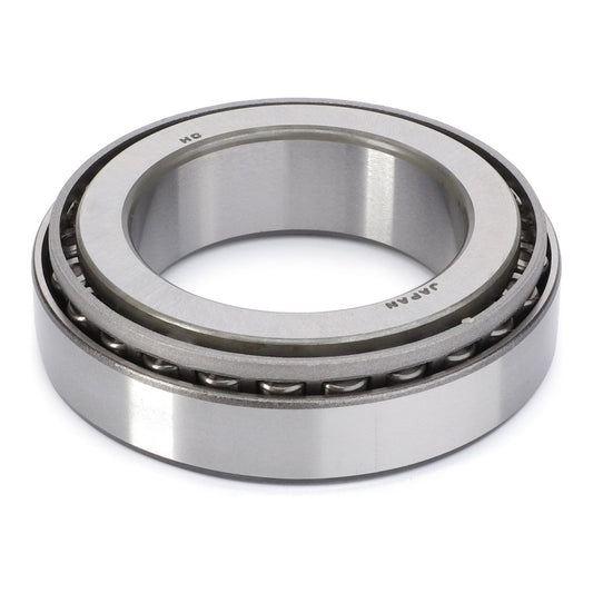 The AGCO Massey Ferguson - Tapered Roller Bearing, Differential - 3009853X1 is a metal roller bearing with tapered roller elements enclosed within an outer ring, typically used in machinery like Massey Ferguson tractors for reducing friction between moving parts.