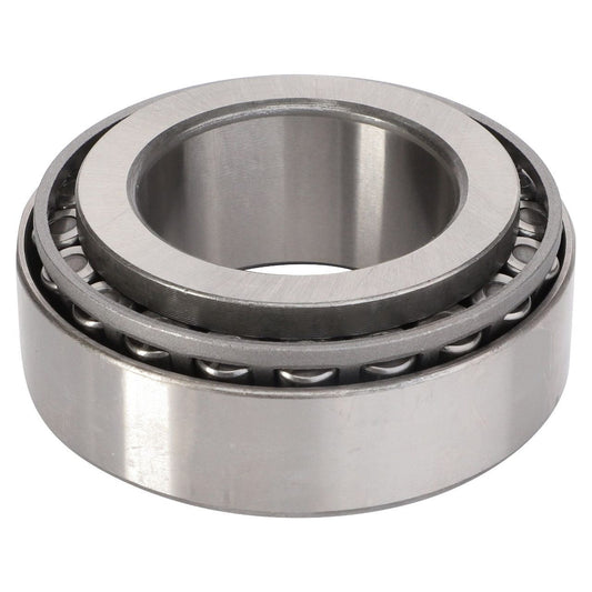 Close-up of a Massey Ferguson - Tapered Roller Bearing, Transmission - 3011324X91 from AGCO, showcasing the inner and outer rings along with the rolling elements.