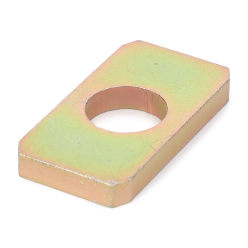 A rectangular AGCO Massey Ferguson Tappet Plate (3616235M3) with a circular hole in the center, viewed at an angle, evokes memories of vintage Massey Ferguson tractor parts. The surface features a subtle metallic sheen.