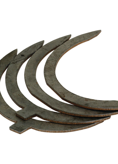 Four crescent-shaped metal pieces from the Thrust Bearings Set +0.0075 (Sparex Part No.S.40346) are laid next to each other on a white background, branded by Sparex for Allis Chalmers.