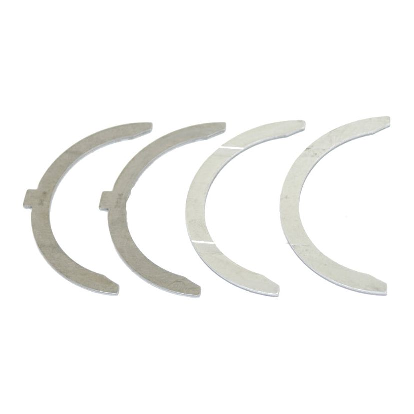 Four silver crescent-shaped metal pieces, part of the Thrust Bearings Set (Sparex Part No. S.42427) for the Massey Ferguson 23C 4 Cyl Diesel Engine, are aligned in a straight row against a white background.
