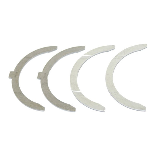 Four silver crescent-shaped metal pieces, part of the Thrust Bearings Set (Sparex Part No. S.42427) for the Massey Ferguson 23C 4 Cyl Diesel Engine, are aligned in a straight row against a white background.