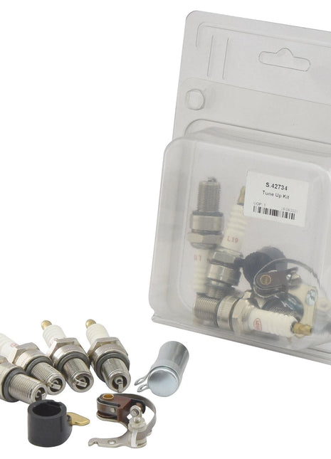 A Sparex Ignition Kit - S.42734 containing four spark plugs, a set of points, a condenser, and several small components, all packaged in a clear plastic case.