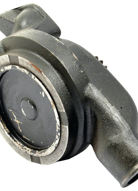 Rusty black and silver automotive part with a circular center, an elongated outlet, and gear details on its side, resembling a Water Pump Assembly (Sparex Part No. S.43549) for Massey Ferguson machinery by the brand Sparex.