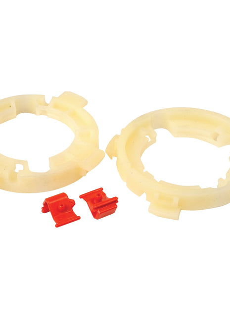 Two yellow 67mm circular plastic parts and two small red plastic clips, perfect for use with the PTO EasyLock Bearing (X/Large) by Sparex.