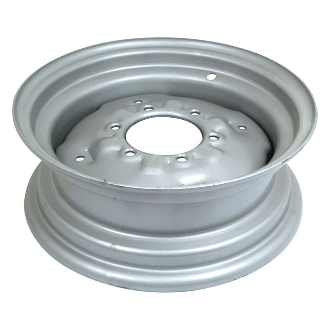 The Sparex Wheel Rim (S.40287) is a 5.5 x 16'' silver steel rim featuring a circular groove pattern and multiple holes around the central hub, designed to accommodate various tyre sizes perfectly.