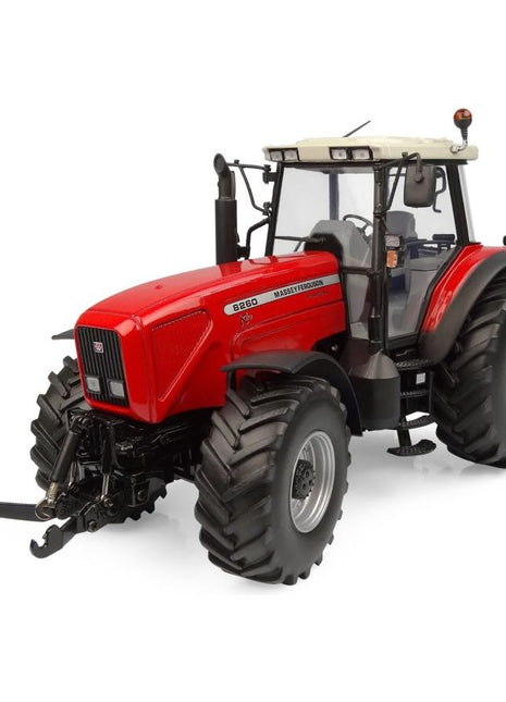 The AGCO Massey Ferguson MF 8260 XTRA 1:32 scale model (X993042205351) is a detailed replica of a large red four-wheel tractor. It features a white cabin, black tires, and an attached toolbox at the back, all set against a white background.