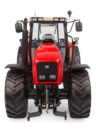 Front view of a 1:32 scale replica red Massey Ferguson MF 8260 XTRA agricultural tractor by AGCO, featuring large front and rear tires, a white roof, and visible headlights and exhaust pipe (Product Code: X993042205351).