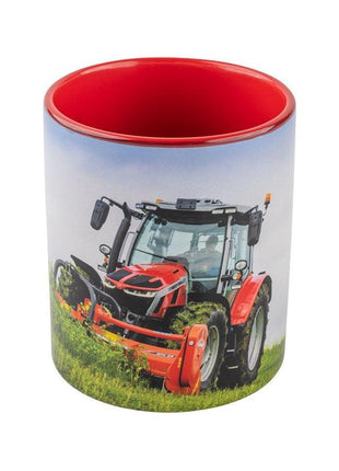 A ceramic mug from AGCO, named "Massey Ferguson - Mf 5S Mug - X993442203000," features a printed motif of an MF 5S red tractor on a grassy field and has a red interior.