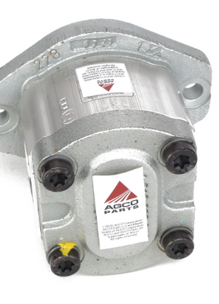 The AGCO | Pump - Acx2754290, branded under "AGCO," is a hydraulic pump secured by four black bolts and features a metallic body with two mounting holes on its flange. Unfortunately, no current product description information is available.