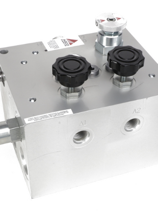 The AGCO Needle Valve - Acw5459260 is a metallic hydraulic component that features two prominent black knobs on the top and various ports on the sides and front. No current product description information is available.