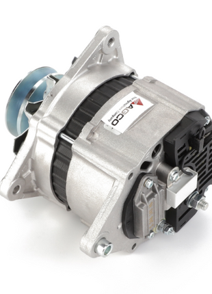 A close-up image of the AGCO Alternator - Acp0227350 showcases its detailed components and a pulley at one end, with a tagged label on the silver casing. The durable casings of this AGCO Genuine product ensure reliable operation.