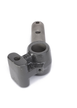 Close-up of the AGCO Spindle - Fel15108409, a metal mechanical component featuring a cylindrical extension and multiple holes, designed for use in machinery or industrial applications. No current product description available.