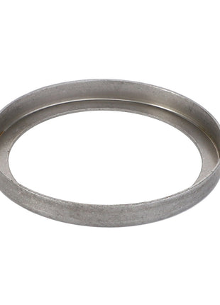 A sleek AGCO | Lock Washer - F184108080090 with a flat profile and smooth edges is displayed against a pristine white background.