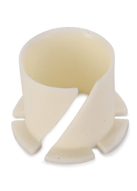 The AGCO Bearing - 3699935M1, a white plastic cylindrical clip featuring a vertical slit and four small protruding tabs at the base, is ideal for securing components on Massey Ferguson models.