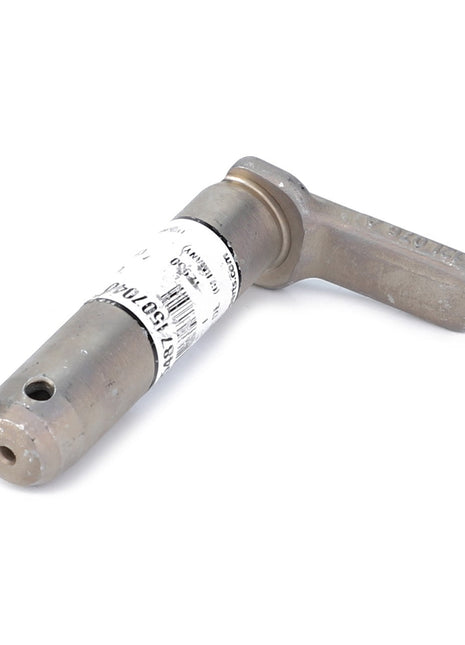 A metal valve from AGCO, the Clevis Pin - F954871507040, features a labeled body and T-shaped lever, with a hole in the cylindrical component for linkage components.