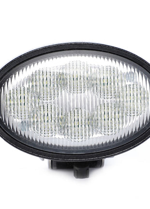 Close-up of the AGCO | Work Light, LED - Acw1547170, an oval-shaped and durable work light featuring a black frame and a ribbed, transparent cover designed for low energy consumption.