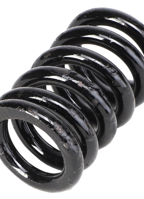 Close-up of the AGCO | Compression Spring - Acw1403590, showcasing a black metal spring with visible wear on its edges. No current product description information is available for this item.