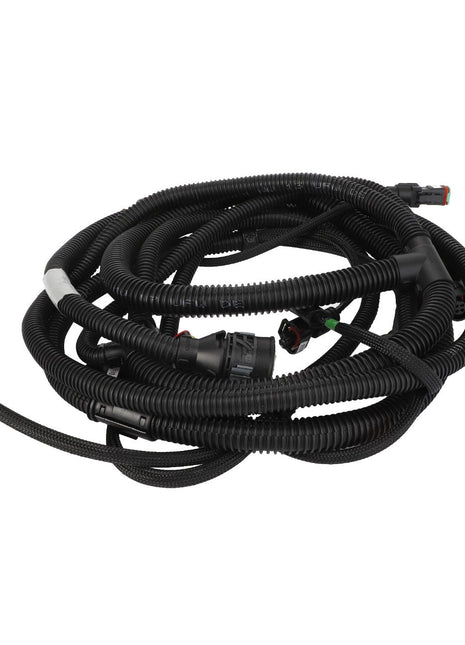 The AGCO Harness - ACW219184A, a coiled black automotive wiring harness with various connectors and plastic tubing, is currently listed with no product description information available.